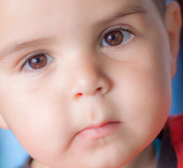 closeup of child with brown eyes