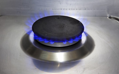 The burning torch on the gas stove
