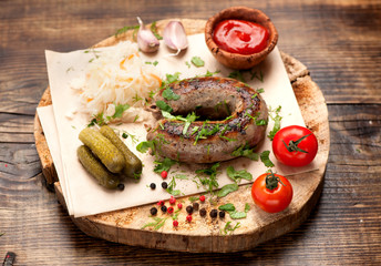 frying sausage on a serving board