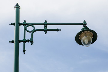An old Thailand green streetlamp in a rural
