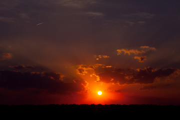 summer sunset in the field. a hot evening.