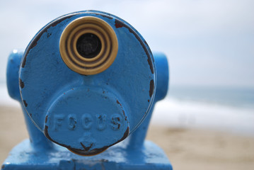 Close up blue telescope view point looking out to the ocean with copy space