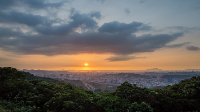 4K timelapse of Taipei basin from a temple, sunset to twilight, Taiwan