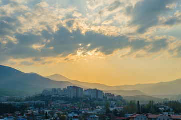 Fototapeta premium Sunset in the city of Alushta on the background.