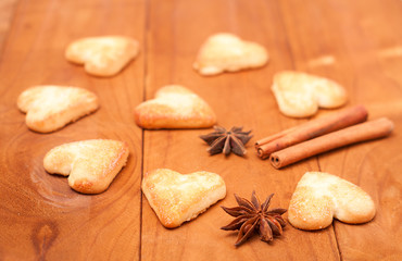 Fototapeta premium Cookies in the shape of a heart on wooden background