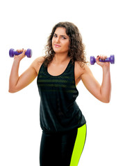 sporty woman with heavy steel dumbbells