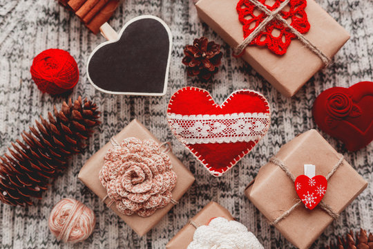 Valentine's Day symbols - hearts, presents in craft paper