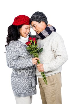 Older Asian Man Giving His Wife Flowers