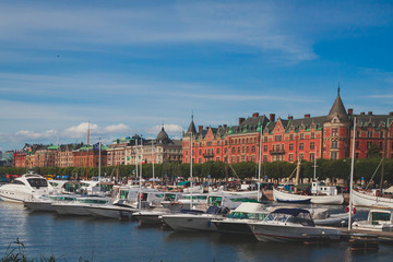 Beautiful super wide-angle panoramic aerial view of Stockholm, Sweden with harbor and skyline with scenery beyond the city, seen from the observation tower, sunny summer day with blue sky   © tsuguliev