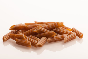 Bunch of pasta made of buckwheat flour isolated over white backg