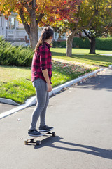  women riding longboard skateboard outdoor