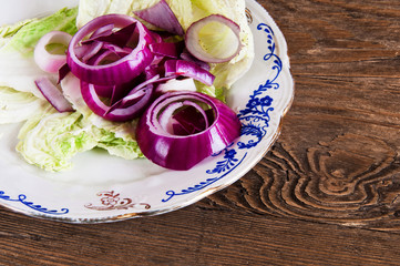 lettuce and onion on a plate