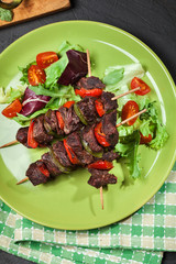 Grilled beef meat and vegetable kebabs