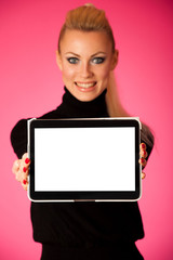 Woman holding tablet computer with blanck screen for commercial,