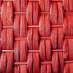 Imaginative red woven reed / wood abstract background texture.