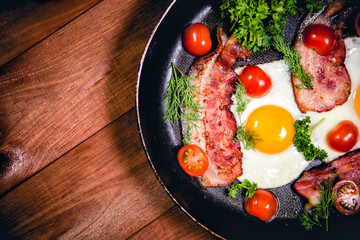 Scrambled eggs with bacon delicious breakfast