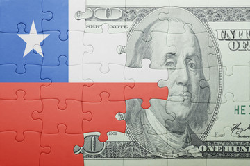 puzzle with the national flag of chile and dollar banknote