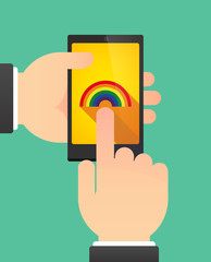 Hands using a phone showing a rainbow