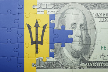 puzzle with the national flag of barbados and dollar banknote