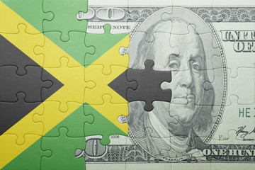 puzzle with the national flag of jamaica and dollar banknote