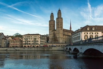 Church of Grossmunster and reflection in Limmat River, Zurich, Switzerland