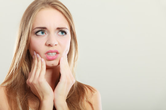 Toothache. Woman Suffering From Tooth Pain