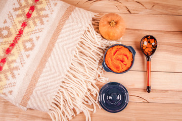 Pumpkin porridge with millet in the clay pot