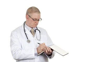 Doctor wearing glasses and stethoscope writing in his notepad isolated on a pure white background