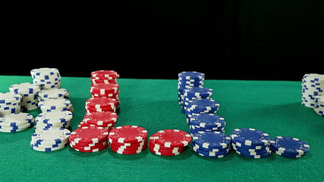 Text "All in" written with poker chips