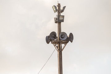 Fototapeta na wymiar Speakers on light poles