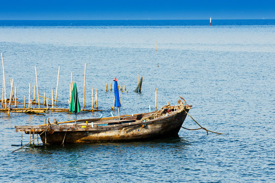 Small fishing boats in the sea.