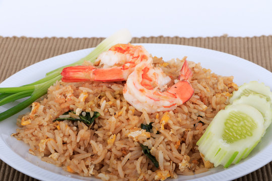 Fried Rice with Shrimp and Vegetables on White Plate and White Background, Thai cuisine