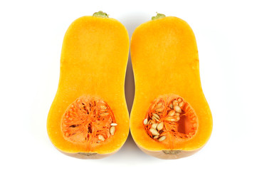butternut squash cut in halves isolated on white background