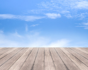 Wood table top on blue sky background  - used for display your products