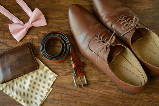 bowtie, brown leather shoes, pocket square