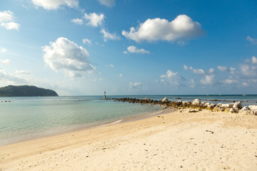 Fototapeta na wymiar stone spit into the sea. Beautiful tropical landscape