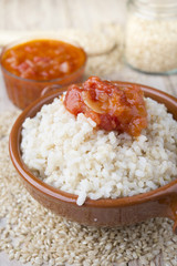 Fototapeta na wymiar Mexican Rice - Rice cooked with tomato sauce
