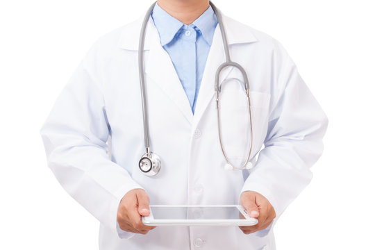 Doctor working on a digital tablet on white background.
