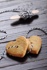 Heart shaped sugar cookies tied with rope.