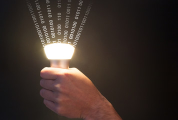 Lifi concept with bulb emitting data and hand