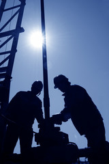 The oil workers are working
