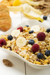 Light, delicious breakfast with cereal and fruit.