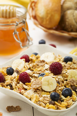 Light, delicious breakfast with cereal and fruit.