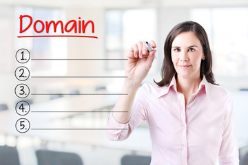 Business woman writing blank Domain list. Office background. 