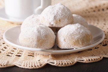 Traditional Mexican polvorón cookies macro on the table. Horizontal
