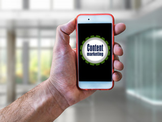 Content Marketing, Marketing Concept Hand holding mobile