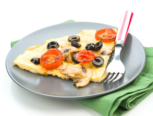 Real homemade tortilla with mushrooms tomatoes and olives