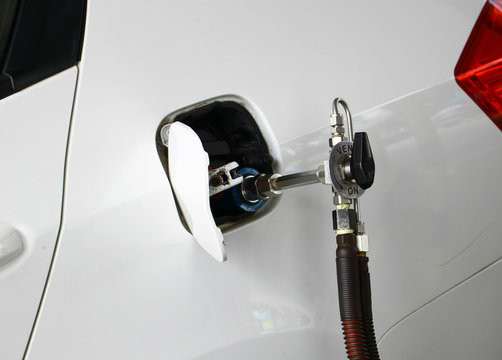 The close up shot of LPG gas refiling
