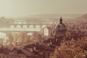Fototapeta premium Scenic view of bridges on Vltava river and of historical center of Prague