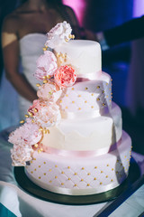 Wedding cake with red roses